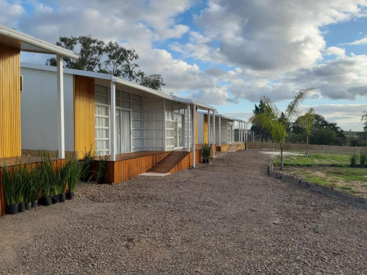 Hotel Terrazas Del Rio Negro Centenario Bagian luar foto